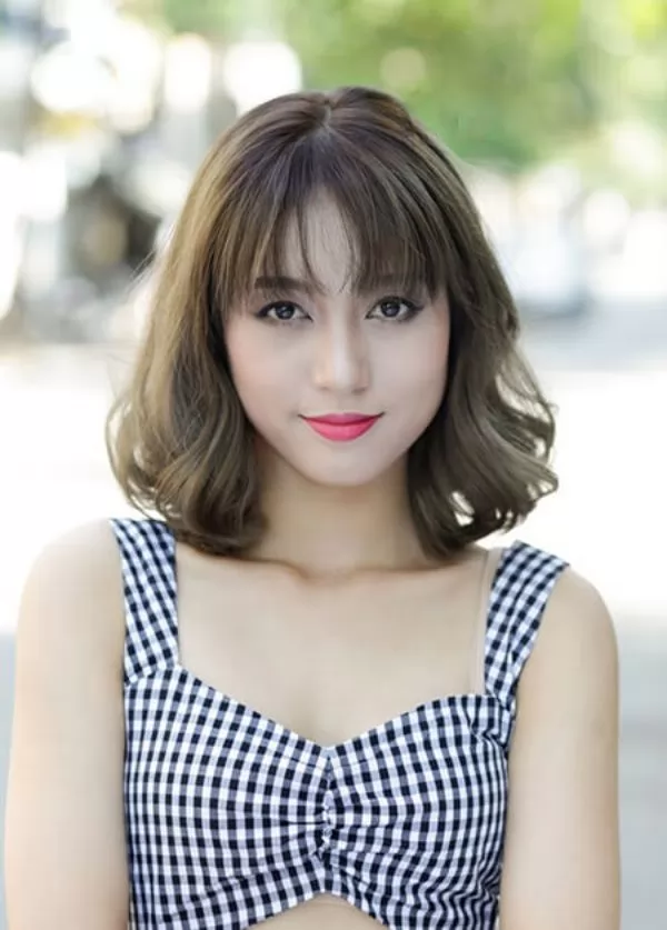 mặt dài để tóc gì