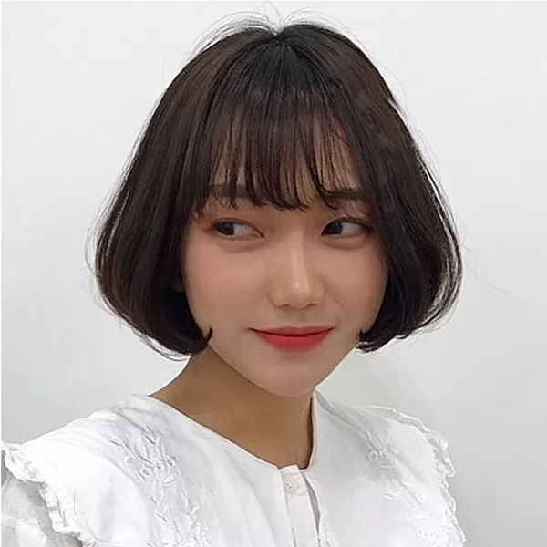tóc ngắn phồng cụp