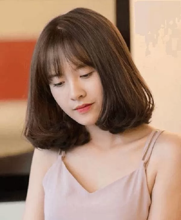 tóc ngắn cho mặt tròn uốn cụp