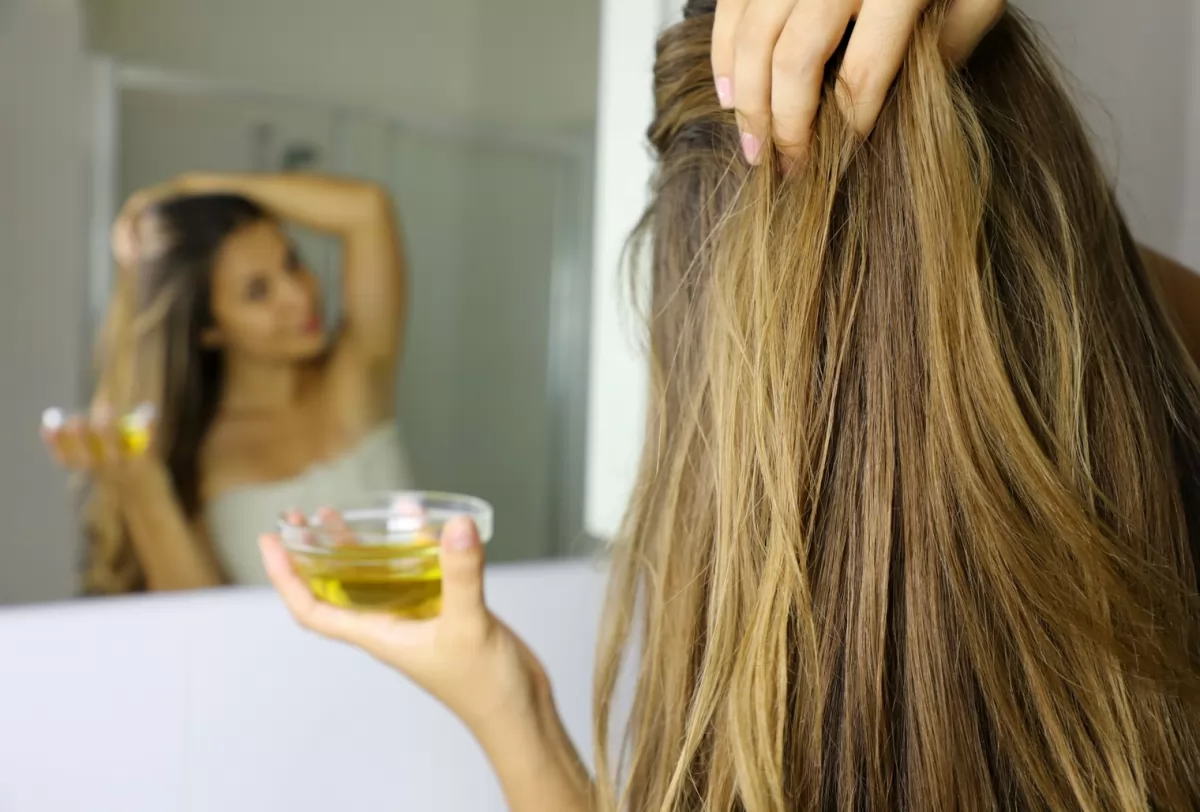 Dầu ô liu ngăn rụng tóc và cải thiện sự phát triển của tóc