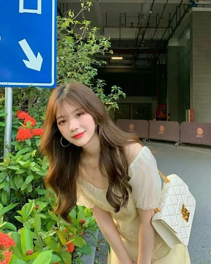 Tóc dài uốn xoăn đuôi