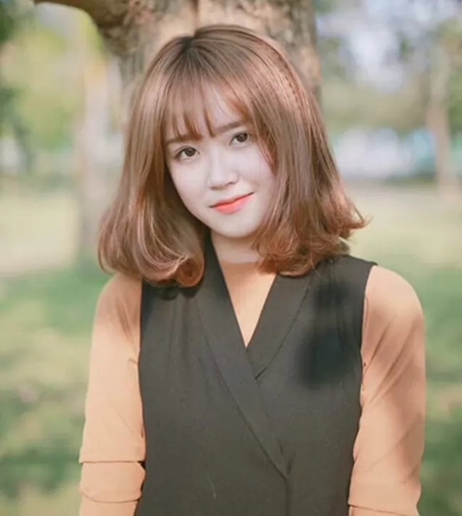 kiểu tóc ngắn cho mặt dài uốn đuôi