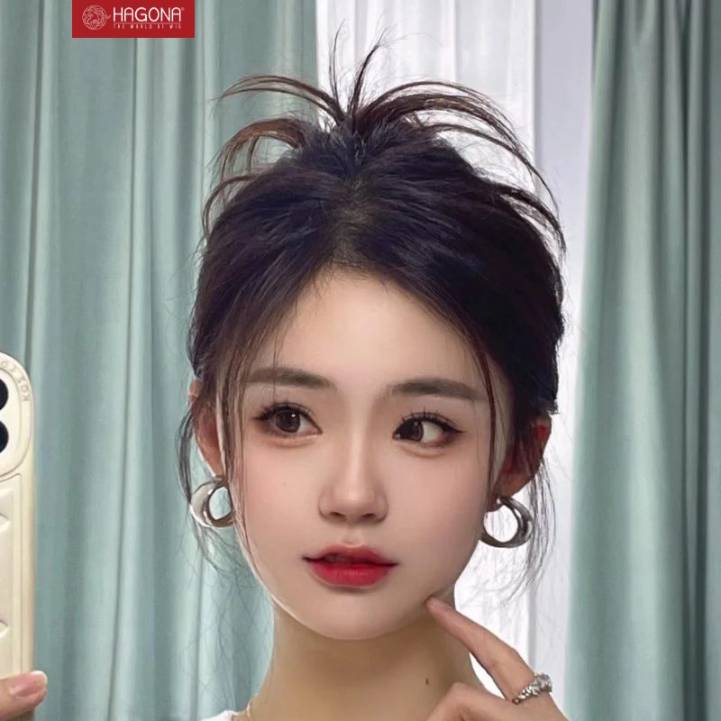 kiểu tóc nữ búi cao