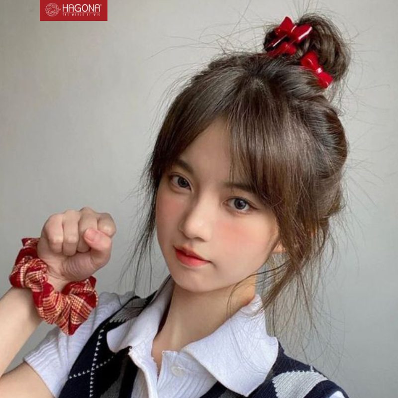 kiểu tóc nữ búi cao