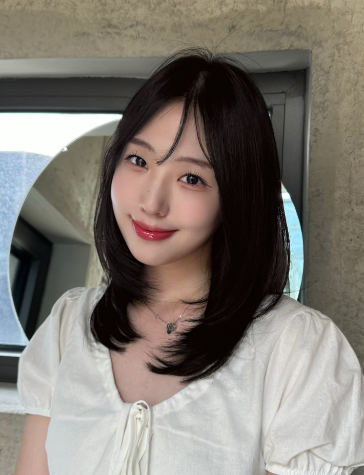 Tóc lửng layer đuôi cụp